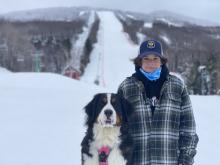 Ski boy and his Burke dog